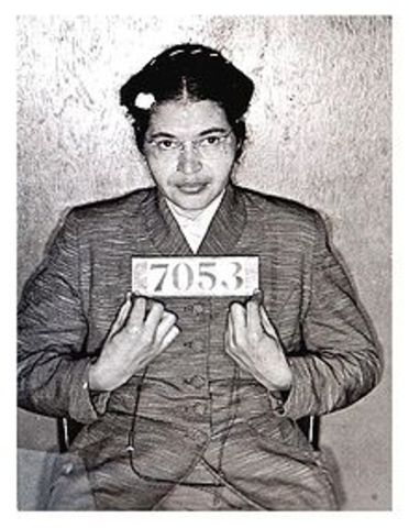 Rosa Parks refuses to give her bus seat