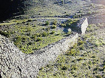 Qin Dynasty starts building walls