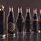 Coca cola bottle history 1899 1900 1915 1916 1957