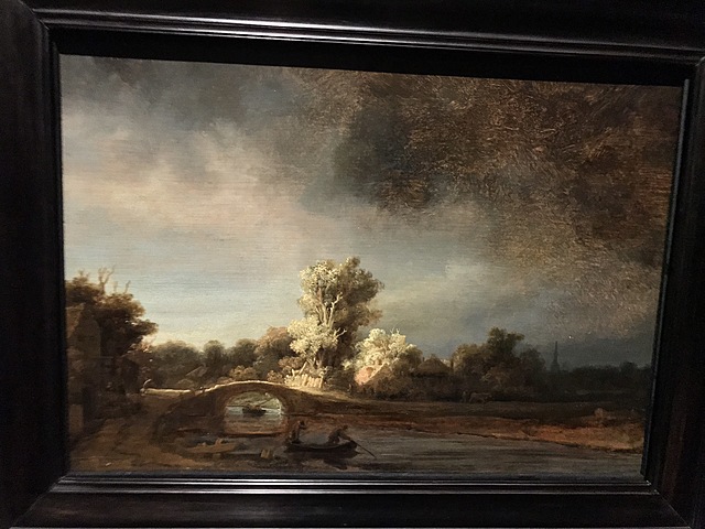 Landschap met stenen brug