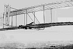 Wilbur Wright begins glider experiments