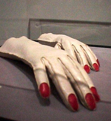 gloves with red python nails,