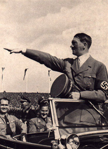Hitler begins military buildup