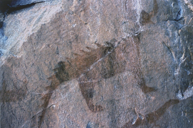 Rock Paintings of the Mishipeshu, a Canoe, and Serpents