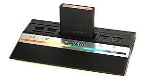 la firma Atari lanzó al mercado el primer sistema de videojuegos en cartucho