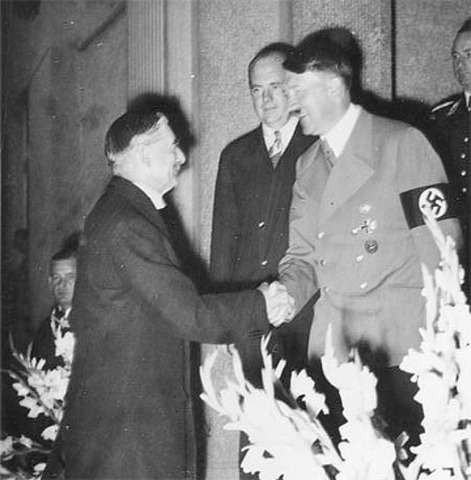 Hitler begins military buildup