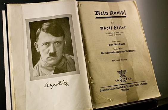Hitler goes to prison and writes Mein Kampf