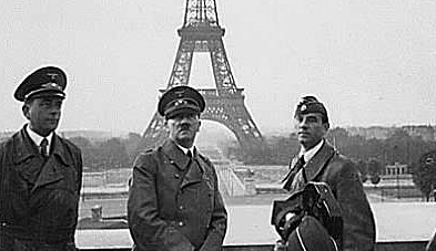 France surrenders and is occupied by Nazi Germany