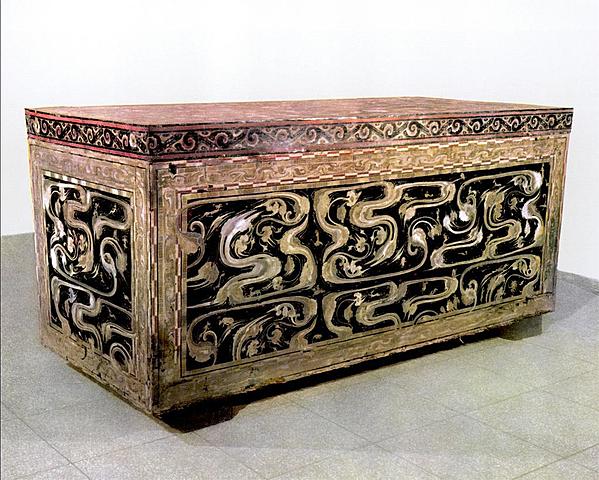 Coffin with cloud patterns