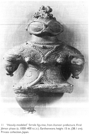 Heavily Molded Female Figurine