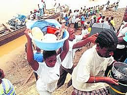 Tamaño familiar y adultos equivalentes