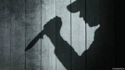 El hombre del traje de color castaño