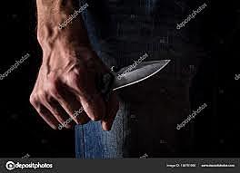 El hombre del traje de color castaño