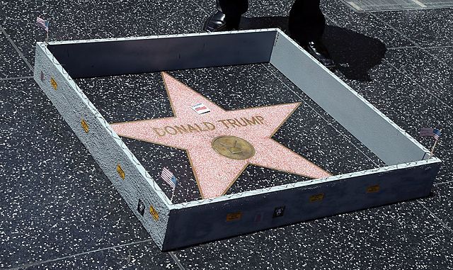 The artist known as Plastic Jesus created this wall which was placed around the star of Donald Trump when he was nominated as a presidential nominee.