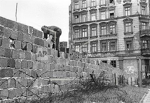 Building of Berlin Wall begins