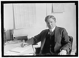 Jem and Scout meet Dill Harris, who brags that he can read.