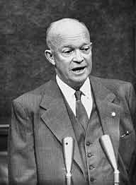 President Eisenhower declares "Domino Theory."