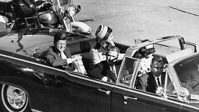 President Kennedy is assassinated, leading to the presidency of Lyndon B. Johnson.22