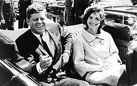 President Kennedy is assassinated, leading to the presidency of Lyndon B. Johnson.