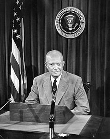 President Eisenhower declares “Domino Theory”