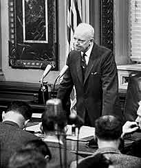 President Eisenhower declares "Domino Theory."