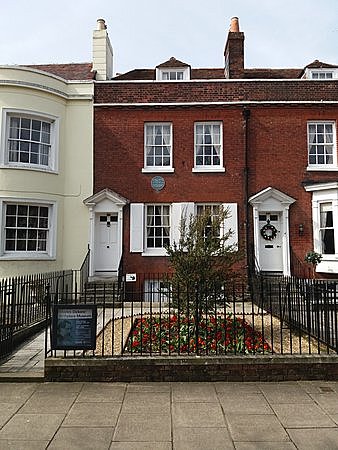 He was born in Portsmouth to John and Elisabeth Dickens