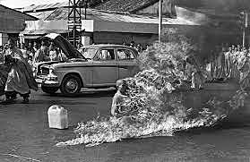 A South Vietnamese monk sets himself on fire.