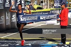 Decreased elevation course brings womens marathon record