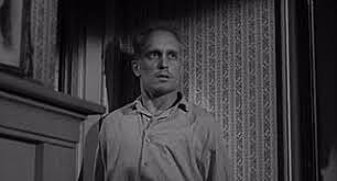 Boo Radley cloaks Scout in a warm blanket.