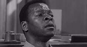 Tom Robinson arrested for raping Mayella Ewell.