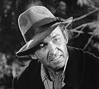 Bob Ewell spits in Atticus' face.