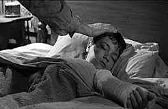 An adult Scout tells us the story about how her brother's arm was broken.