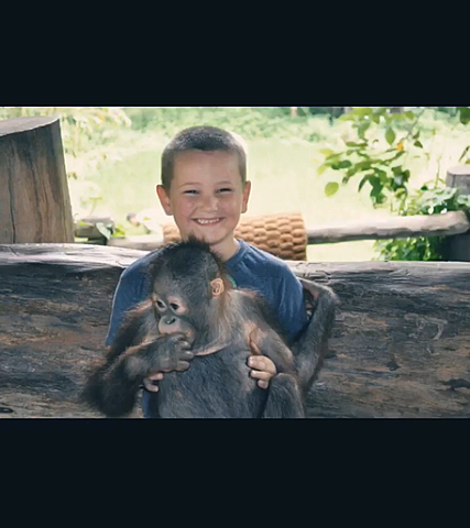 Me Holding A Monkey