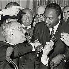 LBJ signs the Voting Rights Act