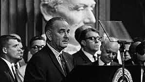 LBJ signs voting right act