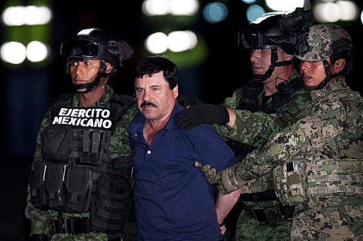 Just being released out of isolation after not seeing light for 30 days Baca heads down to the wardens office ecorted by some gaurds