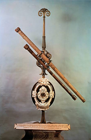 Galileo discovers and learns about the telescope