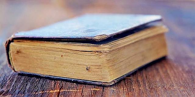 Galileo publishes a book