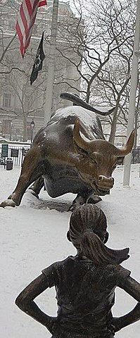 Fearless girl and the charging bull