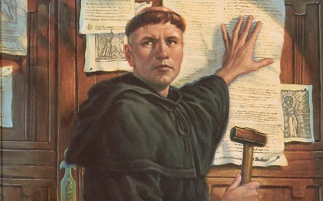 Luther nails Ninety-Five Theses to Castle Church