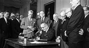 Lyndon B Johnson Signs Civil Rights Act