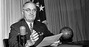 Truman Signs Marshall Plan