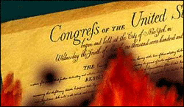 Garrison burns the U.S. Constitution