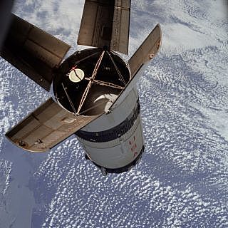 Apollo 7 orbits the Earth and Moon
