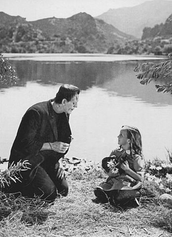 Felix hits the monster with a stick