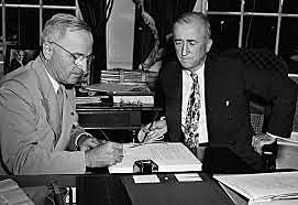 Truman signs Marshall Plan