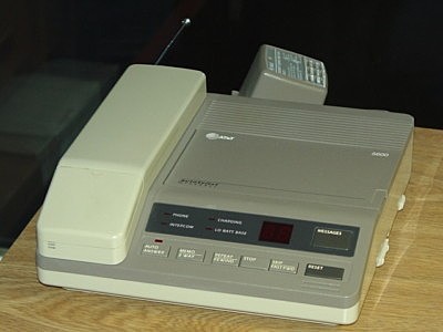 Cordless phone with pull out atenna