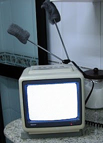 Tv com Bombril na antena