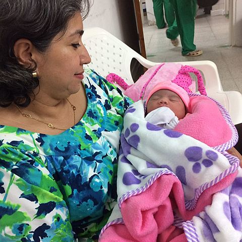 My Daughter with her grandma in her first day of life