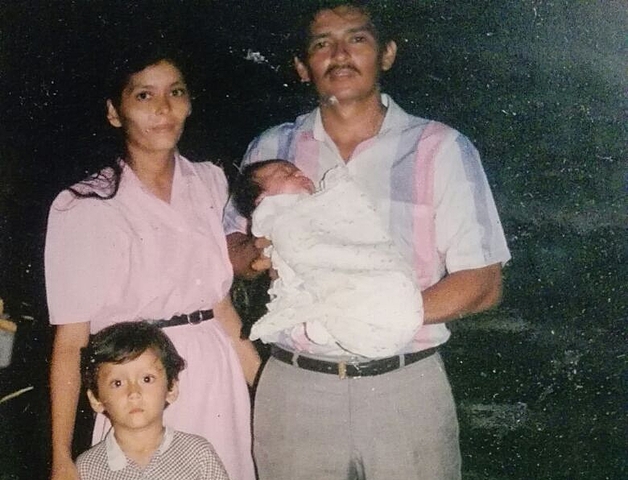 With my parents and my brother